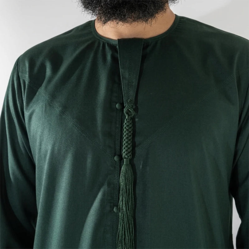 Man wearing Dark Green Emirati Thobe Kandura Jubba