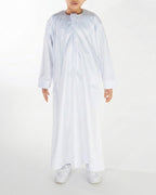 boy wearing a white coloured premium Emirati thobe 