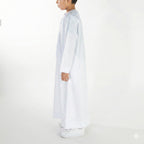 boy wearing a white coloured premium Emirati thobe 
